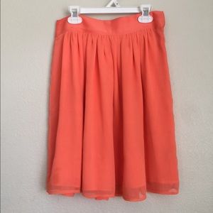Coral/orangish skirt